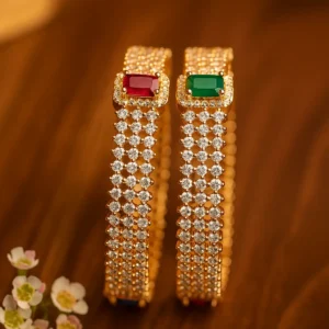 Ruby and emerald studded diamond bangles premium wedding jewelry perfect for festive occasions