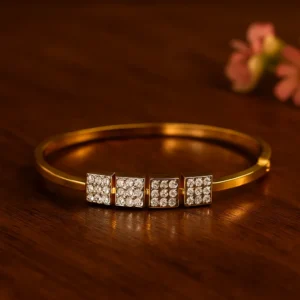 Square block diamond bracelet in gold finish with minimalist modern design for partywear styling