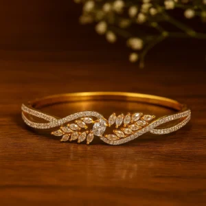 Leaf pattern diamond bracelet in gold finish with elegant marquise design for timeless luxury style