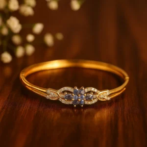 Blue sapphire floral diamond bracelet in gold tone for elegant royal evening style