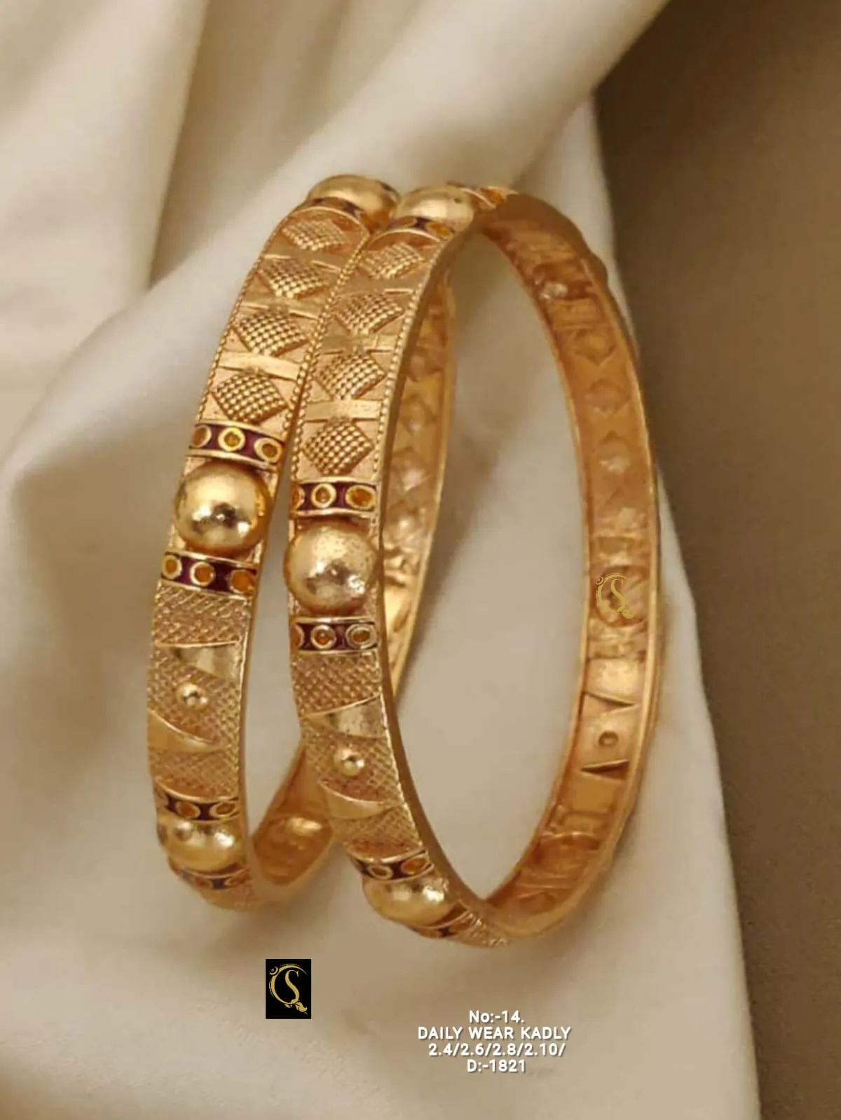 Embossed design kadli bangles with classic gold polish