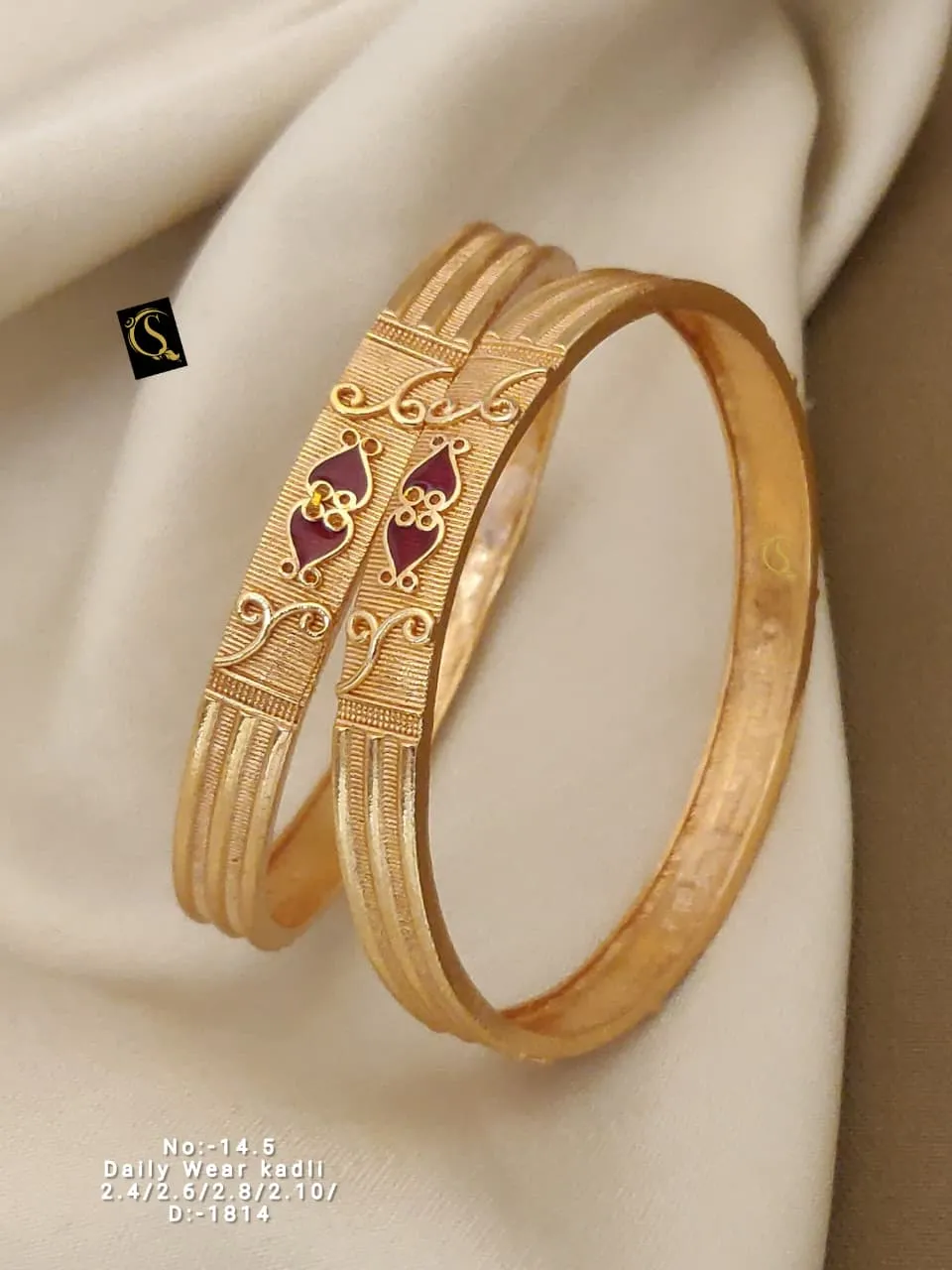 Artistic kadli bangles with maroon enamel and fine carved detailing