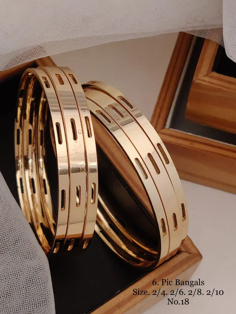High polish sleek designer cut pattern gold bangles for daily wear