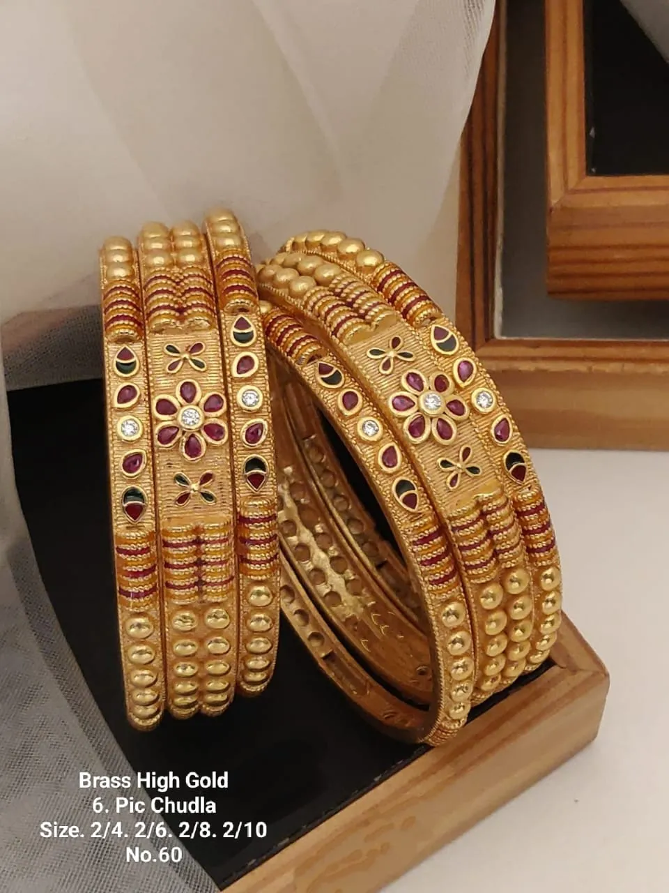 Brass high gold ruby floral stone work chudi set for occasions