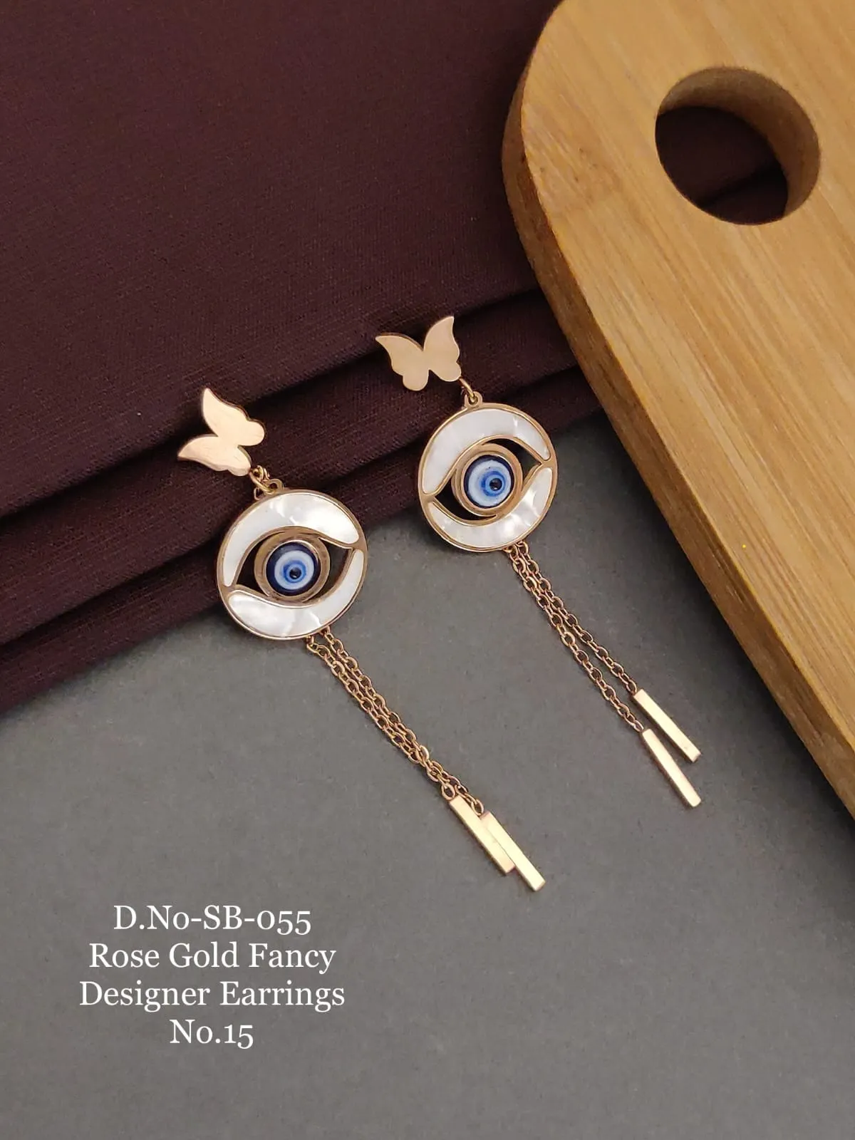 Rose gold evil eye long dangler earrings for fashion styling