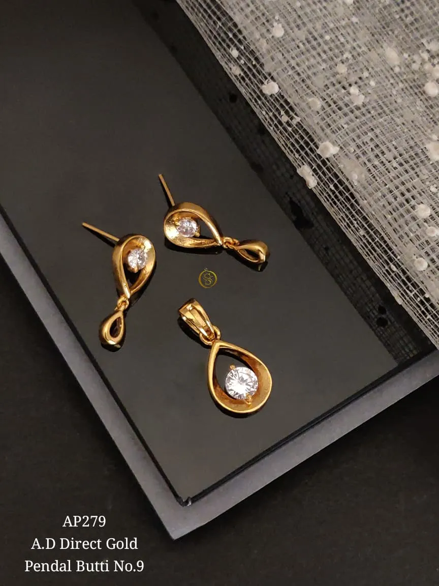 Direct gold ad stone pendant earrings set with simple teardrop solitaire design