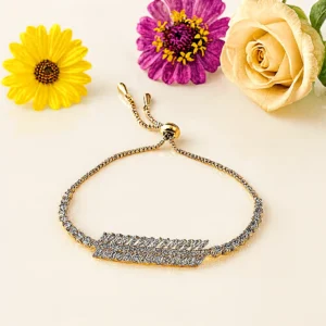 Gold bracelet with diagonal baguette crystal row