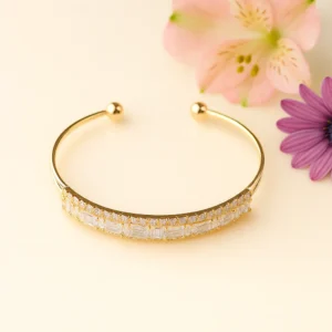 Gold open cuff with layered crystal baguette band