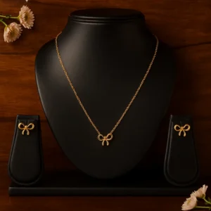 Elegant bow design pendant set with chain and earrings for stylish look