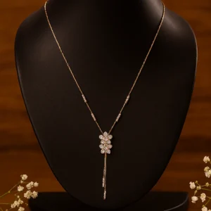 Double flower pendant necklace with sparkling cubic zirconia stones in gold polish